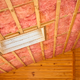 Attic ceiling packed with insulation