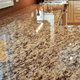 A pristine, polished granite countertop in a new kitchen.