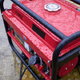 red generator in rain