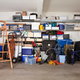 An organized garage with boxes and items. 