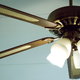 A wood ceiling fan. 