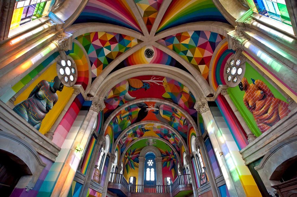 Colorful artwork adorns the walls and ceiling of Okuda San Miguel's 