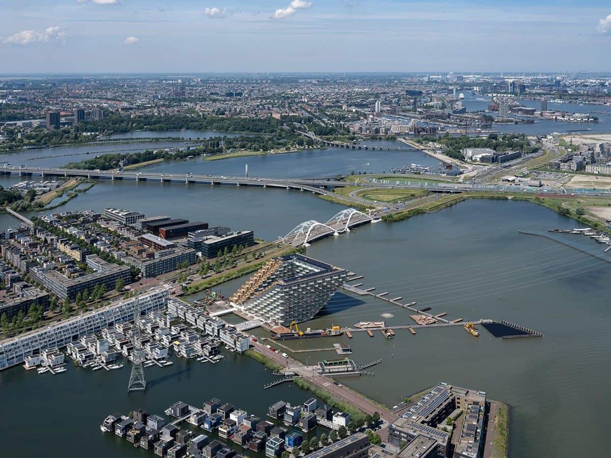 Aerial view of the BIG-designed Sluishuis apartment complex in Amsterdam.