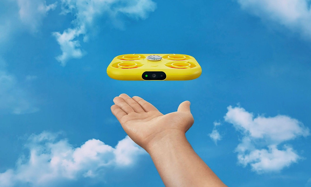 Person holds out their Palm to release their Snapchat Pixy drone.