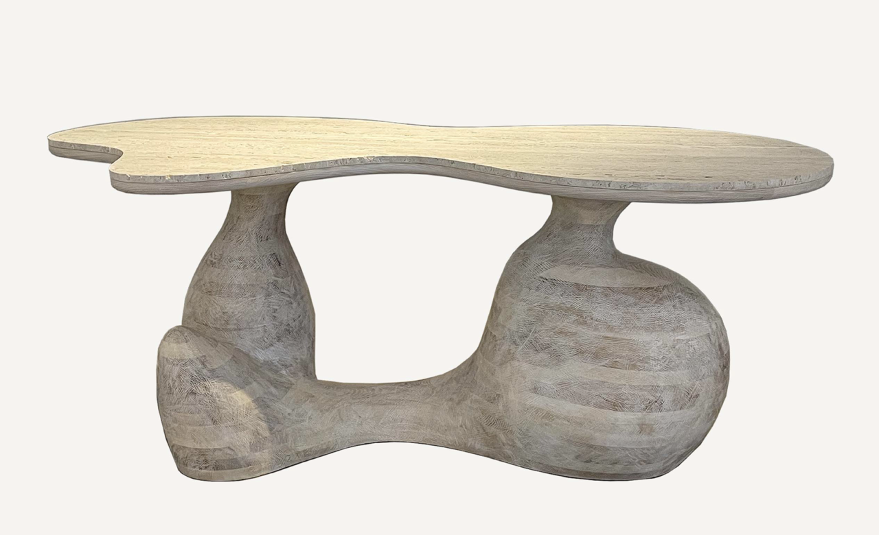 Travertine console table featured in Aaron Poritz' 
