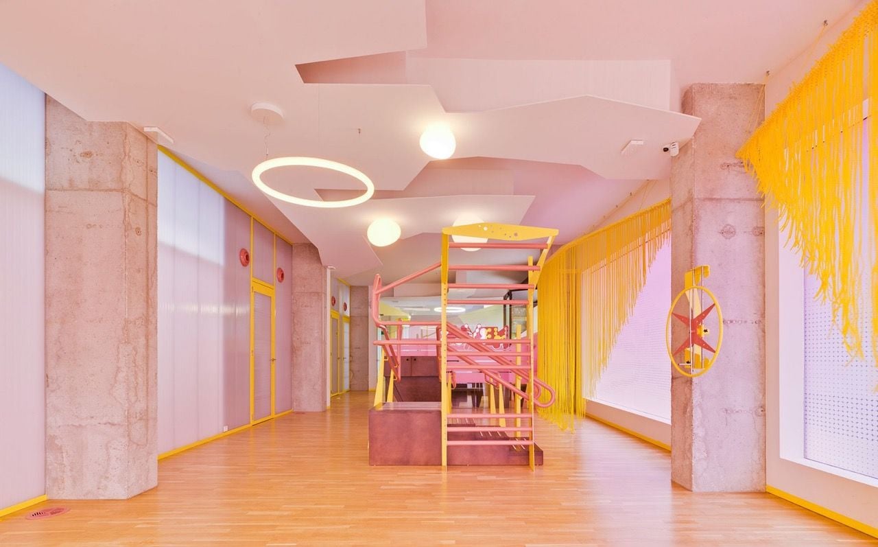 Angular shapes etched into the ceiling further enhance the Form of Care clinic's fun, freewheeling feel. 