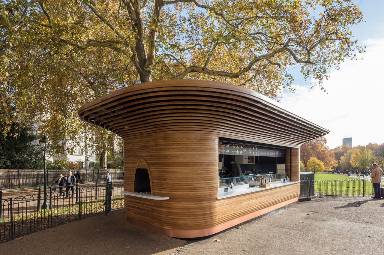 Main counter and pick-up window at a steam-bent wood refreshment kiosk in London's Royal Parks.