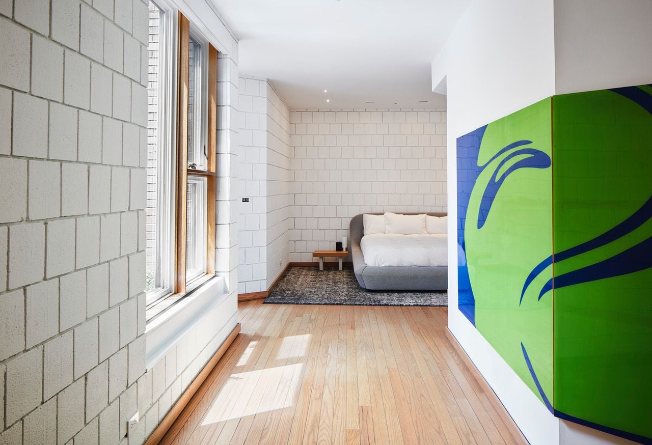 Swank modern master bedroom inside Walter Netsch’s SOM-renovated Chicago home.