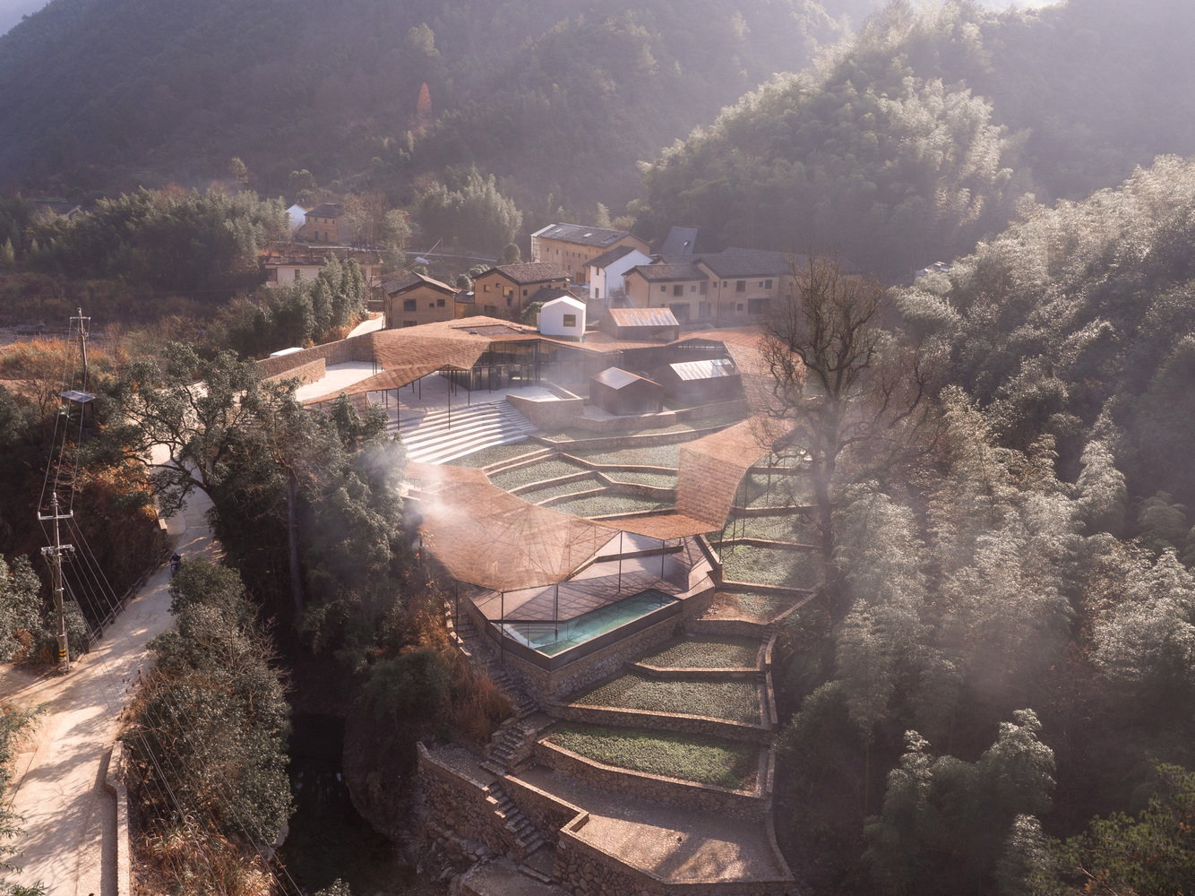 Aerial view of the Sou Fujimoto-designed Flowing Cloud pavilion in China's mountainous Zhejiang province.