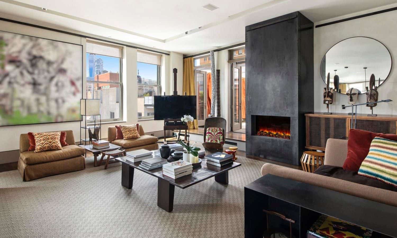 Cozy, stylish fireplace area inside David Bowie's recently-sold Manhattan apartment.