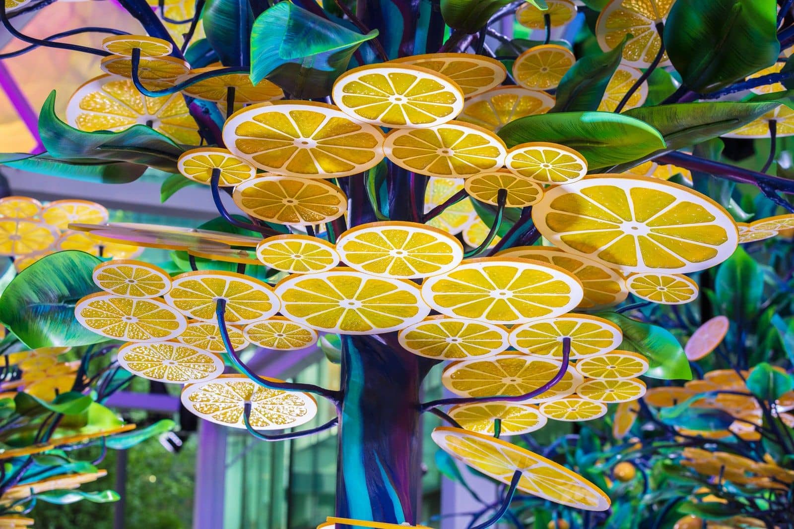 Vibrant lemon slice canopy featured in the Citrovia installation at Manhattan West.