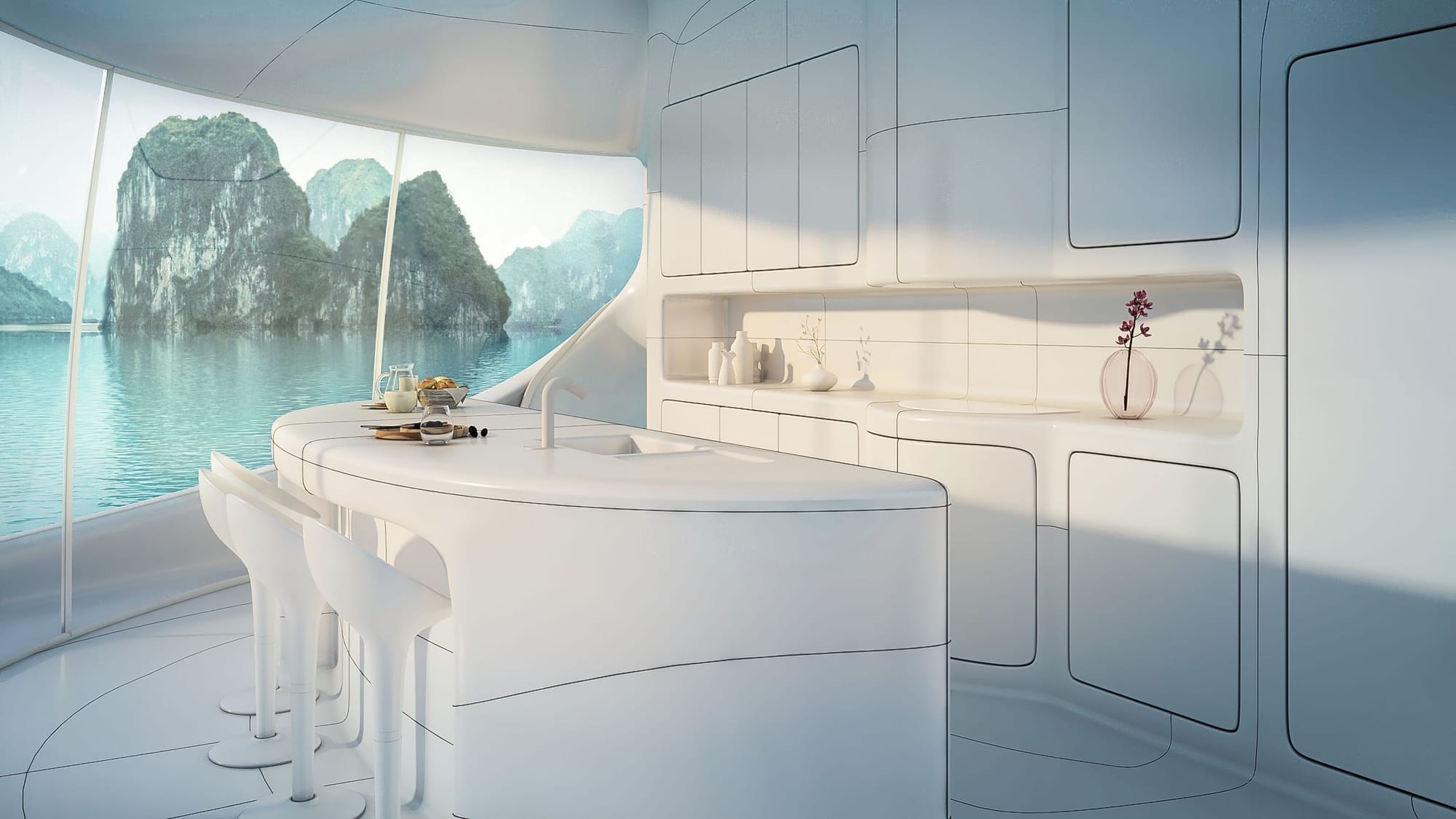 Minimalist kitchen space inside a SeaPod facing gorgeous views of the water. 