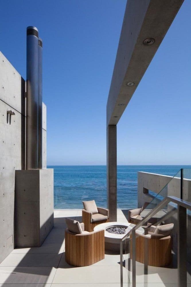 Sparse, relaxing deck area featured in Kanye West's new Tadao Ando-designed Malibu Beach House.