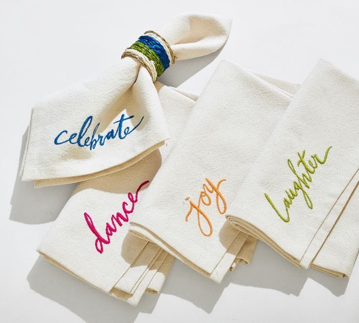 BADG Embroidered Sentiment Cotton Napkins featured in Pottery Barn's new collection with Black Artists + Designers Guild. 