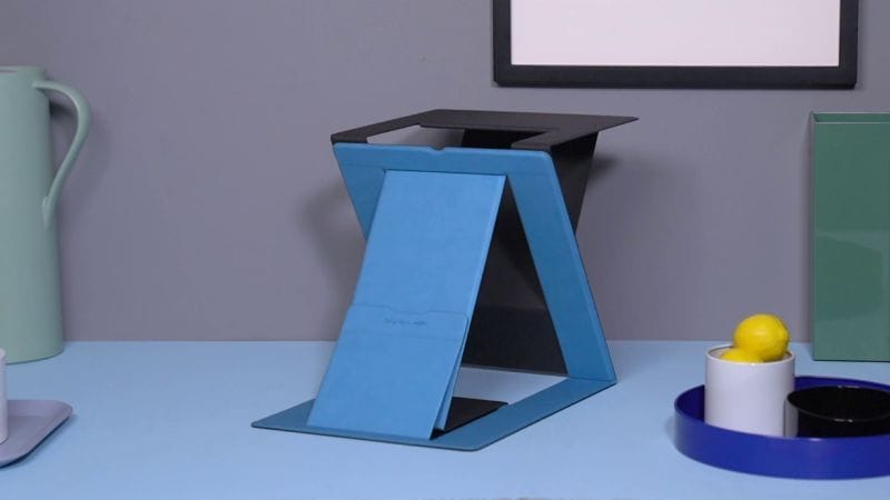 This standalone MOFT Z comes in a shade of blue that perfectly complements the desk it's on.