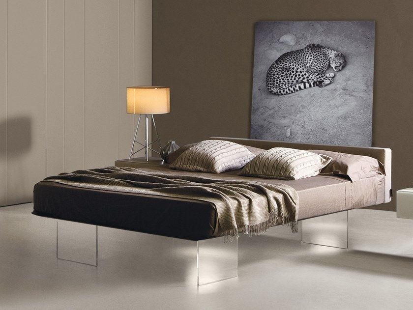 The clear bottom of this bed gives the whole bedroom a lighter, more spacious feel
