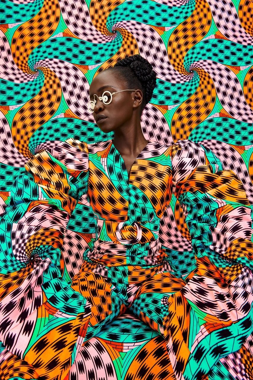 Kenyan woman dons boldly-patterned textiles and upcycled accessories for artist Thandiwe Muriu's 