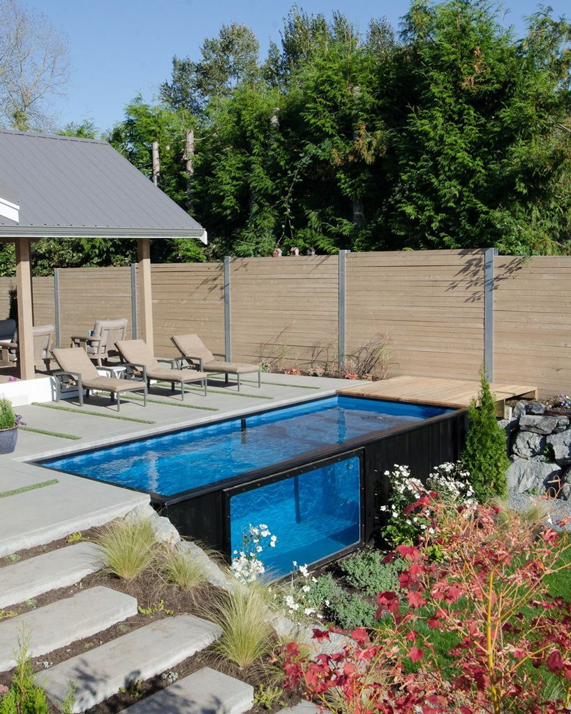 A sleek modern shipping container pool designed by Modpools. 