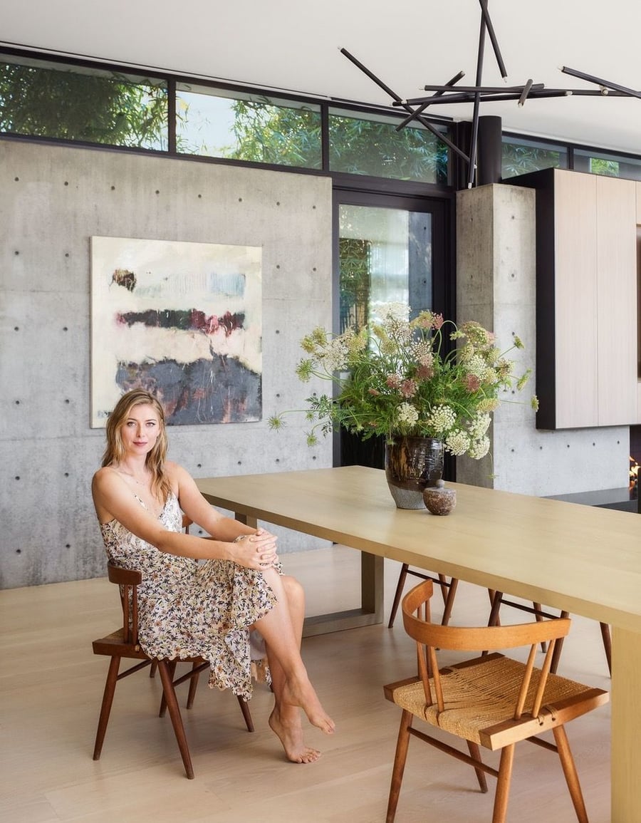 Tennis superstar Maria Sharapova sits in the dining area of her gorgeous LA home.