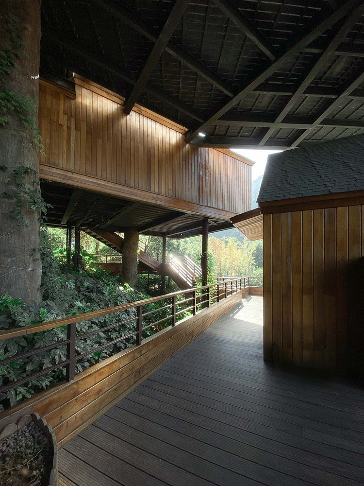 Underneath two of the WH Studio-designed treehouse cabins at China's Xiaoshan Xianghu resort lays...surprise! Yet another terrace. 