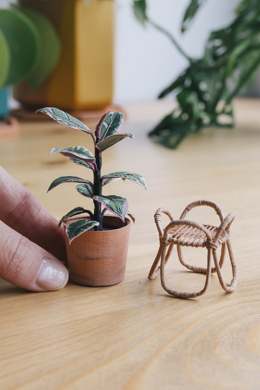 A miniature rubber plant replica by artist Raya Sader Bujana.