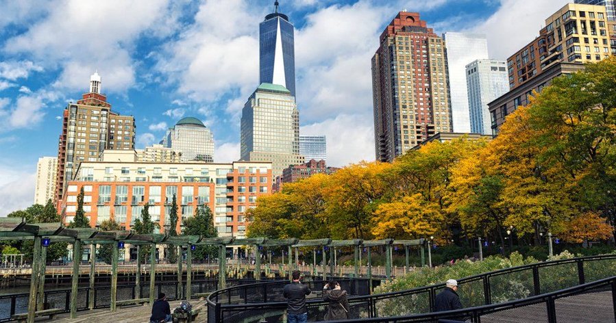 Battery Park City visitors pull out their smartphones to interact with the park's new 