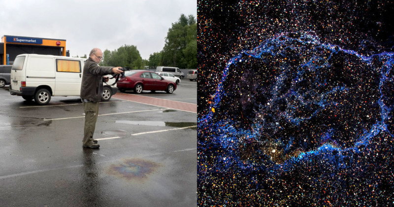 Photographer Juha Tanhua stands over a parking lot oil spill with his camera. 