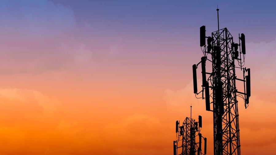 Cell phone towers at sunset.