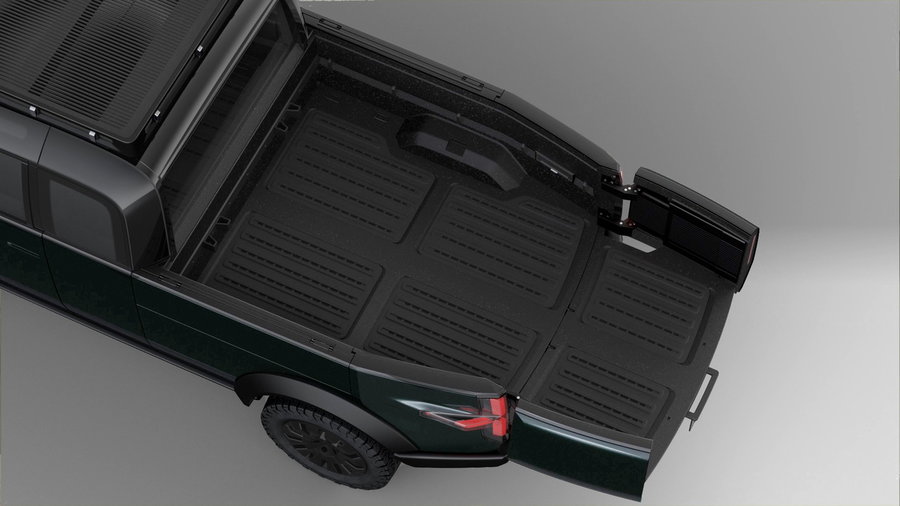 The bed of the Canoo Electric Pickup Truck, fully extended.