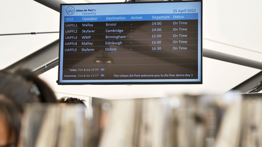 Travel board inside Air-One displays departing and arriving eVOTL vehicles.