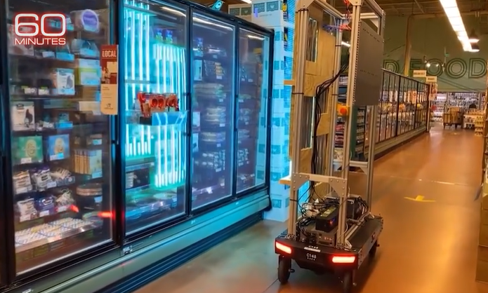 Amazon's new disinfecting robot roams warehouses and Whole Foods stores, using UV lights to disinfect everything in its path. 