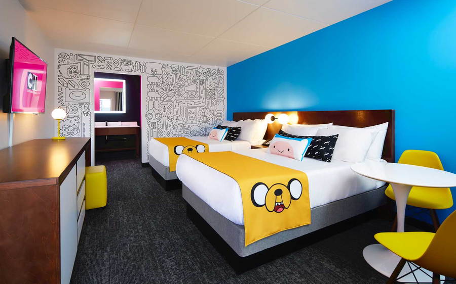 A colorful Adventure Time-themed guest room inside the new Cartoon Network Hotel