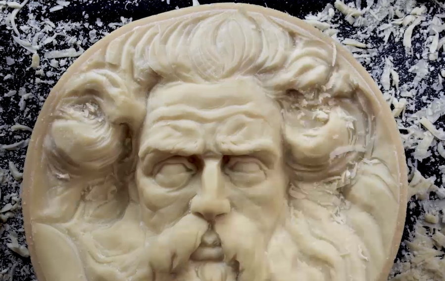 Hand-carved Zeus cheese wheel bust from Italian artist Valeriano Fatica.
