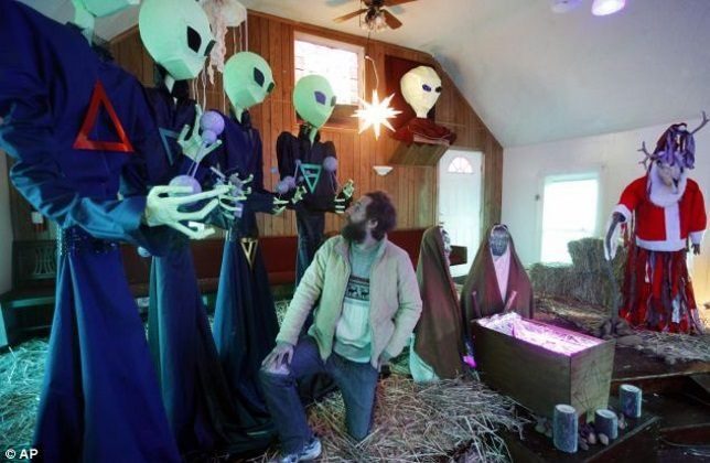 An alien-centered reimagining of the classic Christian Nativity Scene by artist Matt Henderson