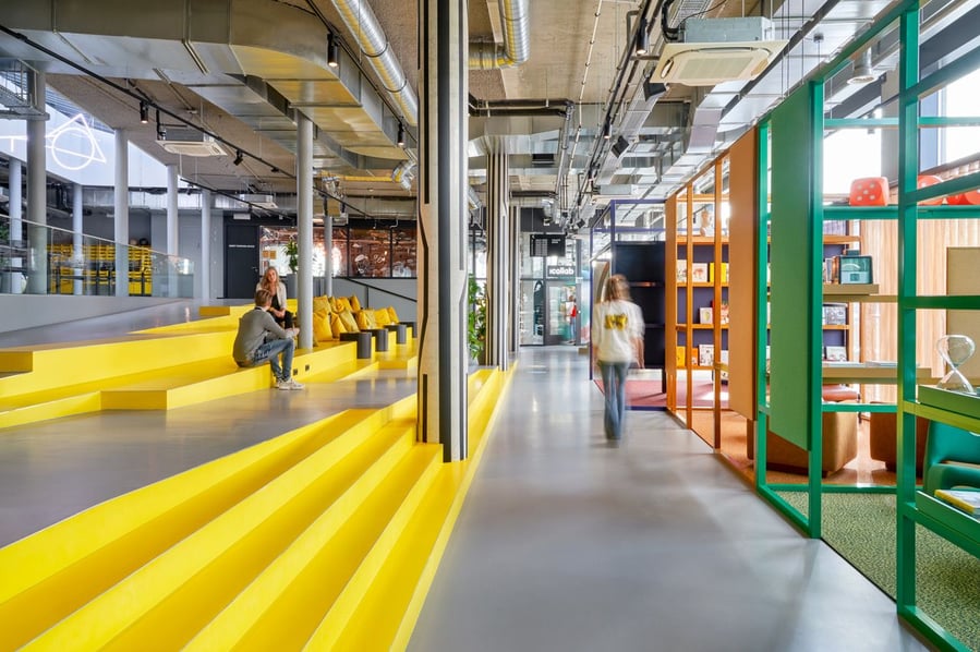These long yellow steps in the Student Hotel Delft can be used as a kitschy co-working spot by day, and seating for a private event come nighttime! 