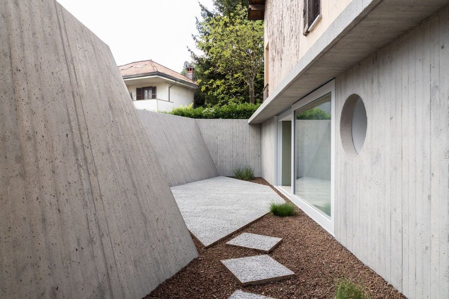 Sunken courtyard area just outside the home's formerly unused basement area.