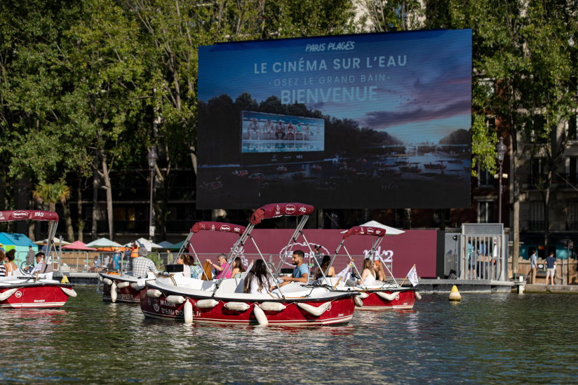 Young Parisians enjoy a relaxing time out on the city's Bassin de la Villette as part of the city's 