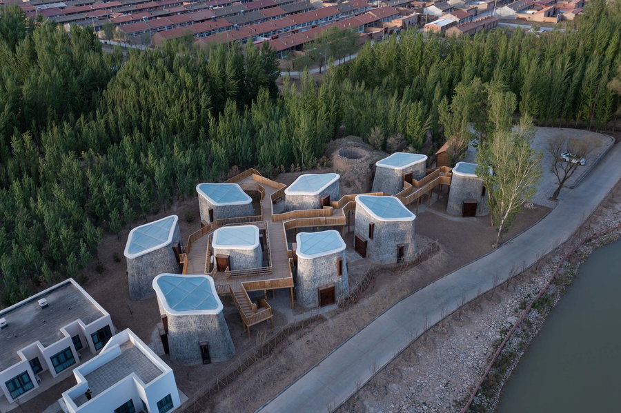 Aerial view of the brick pods that make up the Studio A()VOID-designed 