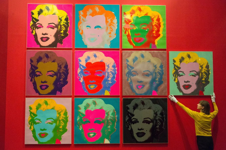 Several different pop art portraits of Marilyn Monroe by Andy Warhol.