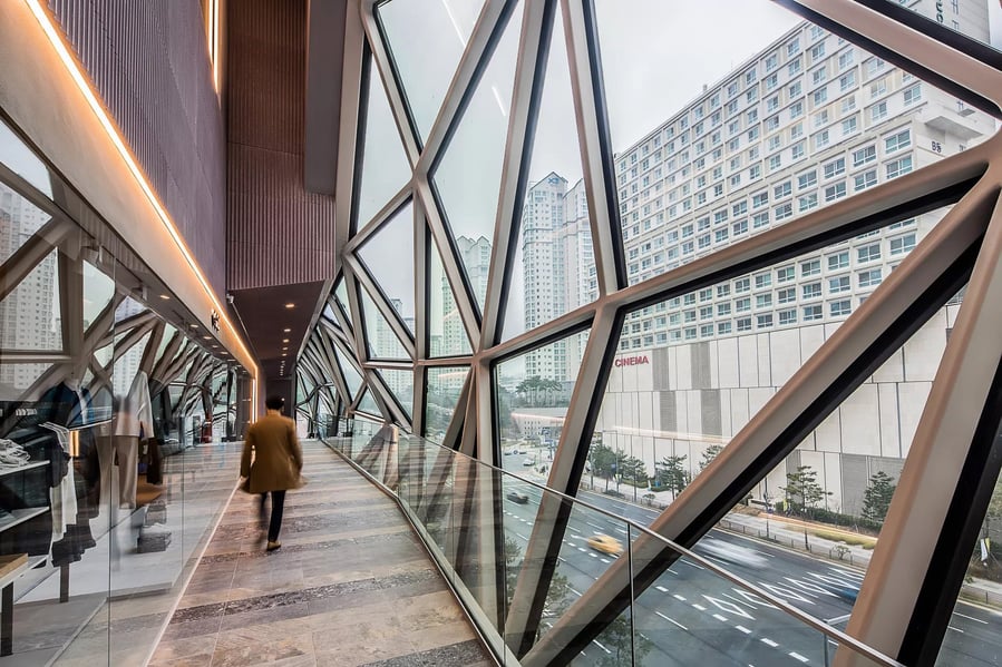 View from inside one of the Galleria in Gwanggyo's rippling geometric glass additions.