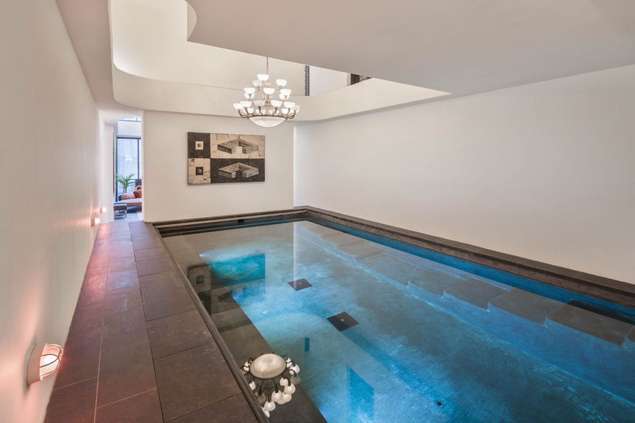 Large indoor pool featured in the basement of 23 Cornelia Street, Taylor Swift's former New York City home.