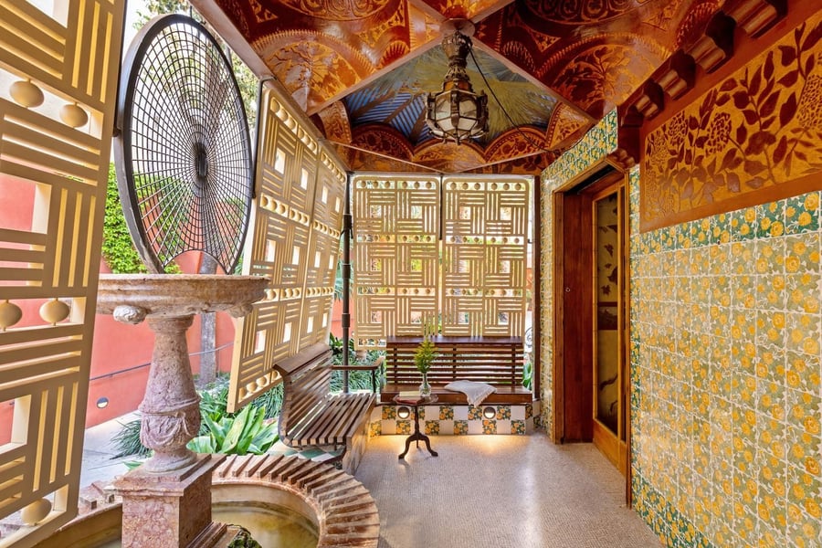 This Casa Vicens sunroom's bold color scheme and geometric patterns are a great example of the Art Nouveau influence in Gaudí's work. 