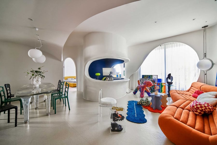 Groovy retro-futuristic interiors of the Red5Studio-designed Ho Chi Minh City apartment.