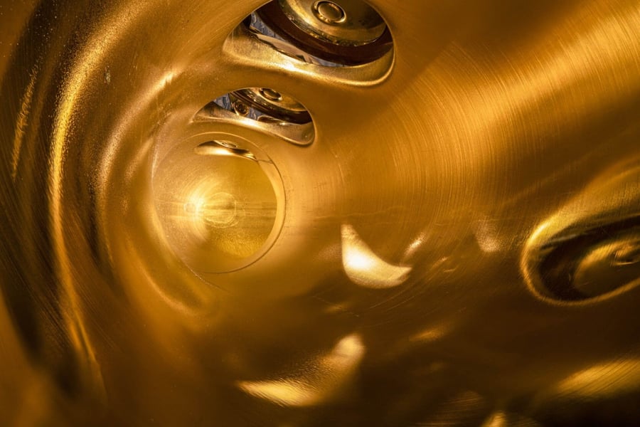 Super close-up look at the inside of a saxophone, as featured in Charles Brooks' 