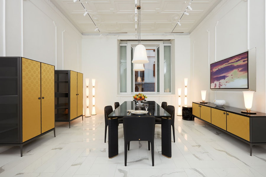 Sleek, lavish dining area in Versace's new flagship home store in Milan.