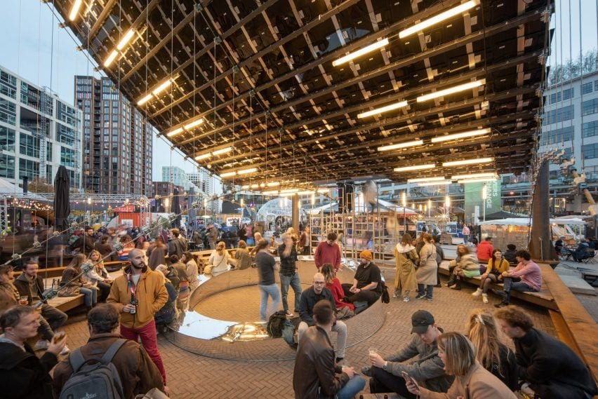 The solar pavilion offered ample room for Dutch Design Week guests to sit and mingle underneath its colorful PV canopy. 