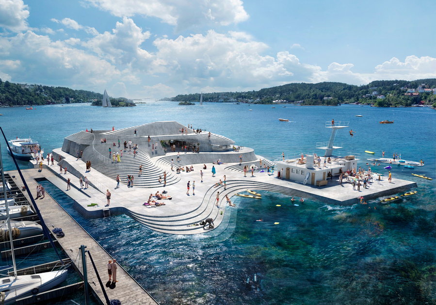 Snøhetta's revamped Knubben Harbor Bath in Norway rises from the sea like a concrete island.