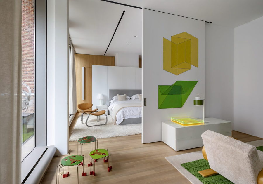 The colorfully accented bedroom inside Lee Mindel's NYC condo.