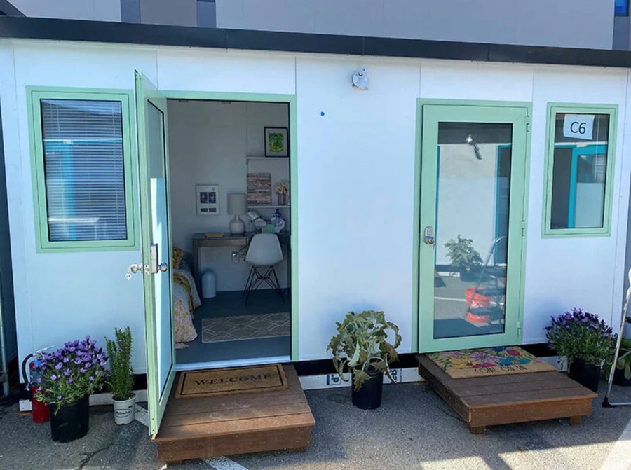 View into the cozy rooms at DignityMoves' new San Francisco tiny home community for the homeless.