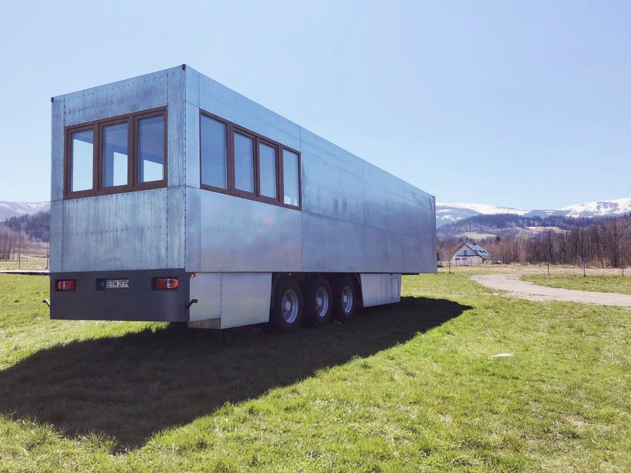 Close-up exterior view of Good Spot's upcycled off-grid guest lodgings in Poland. 